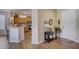 Bright and airy entryway with a view into the kitchen at 17780 W Canto Bonito Ln, Surprise, AZ 85387