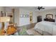 Spacious bedroom with wood floors and ceiling fan at 17780 W Canto Bonito Ln, Surprise, AZ 85387