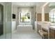 Luxurious bathroom with soaking tub, double vanity, and marble floors at 6044 E Calle Del Paisano --, Scottsdale, AZ 85251