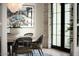 Bright dining room with large windows and a statement chandelier at 6044 E Calle Del Paisano --, Scottsdale, AZ 85251