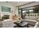 Spacious living room with fireplace and large windows offering mountain views at 6044 E Calle Del Paisano --, Scottsdale, AZ 85251