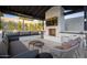 Outdoor kitchen and seating area under covered patio at 6044 E Calle Del Paisano --, Scottsdale, AZ 85251