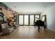 Music room with grand piano and access to a private courtyard at 6044 E Calle Del Paisano --, Scottsdale, AZ 85251