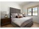 Bright bedroom with a comfortable bed and neutral decor at 6044 E Calle Del Paisano --, Scottsdale, AZ 85251