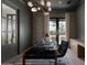 Home office with built-in desk, dark walls, and natural light at 6044 E Calle Del Paisano --, Scottsdale, AZ 85251