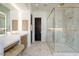 Elegant bathroom with a walk-in shower and marble finishes at 6044 E Calle Del Paisano --, Scottsdale, AZ 85251