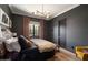 Spacious bedroom with dark-colored walls and large window at 6044 E Calle Del Paisano --, Scottsdale, AZ 85251