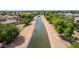 Aerial view of a canal running through a residential area at 2074 E Hulet Pl, Chandler, AZ 85225