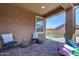 Covered patio with seating and backyard access at 9624 E Thunderbolt Ave, Mesa, AZ 85212