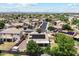 Aerial view of house featuring solar panels and a spacious backyard at 11105 W Ashley Chantil Dr, Surprise, AZ 85378