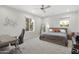 Spacious bedroom with a large bed and a workspace at 9030 N 48Th Pl, Paradise Valley, AZ 85253