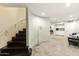Finished basement with staircase and sitting area at 9030 N 48Th Pl, Paradise Valley, AZ 85253