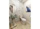 Stylish powder room with a glass sink and mosaic tile at 9030 N 48Th Pl, Paradise Valley, AZ 85253