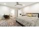 Bright bedroom with ensuite bathroom access and built-in workspace at 9030 N 48Th Pl, Paradise Valley, AZ 85253