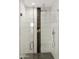 Modern shower with a frameless glass enclosure at 9030 N 48Th Pl, Paradise Valley, AZ 85253