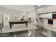 Open game room showcasing a pool table and home bar at 9030 N 48Th Pl, Paradise Valley, AZ 85253