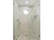 Elegant shower with unique pebble flooring at 9030 N 48Th Pl, Paradise Valley, AZ 85253