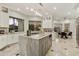 Modern kitchen with a large island and breakfast nook at 9030 N 48Th Pl, Paradise Valley, AZ 85253