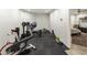 Home gym with exercise equipment and rubber flooring at 9030 N 48Th Pl, Paradise Valley, AZ 85253