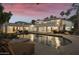 Luxury home with a large pool and beautifully landscaped backyard at 9030 N 48Th Pl, Paradise Valley, AZ 85253