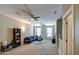Spacious living area with sectional sofa and large windows at 3882 W Alabama Ln, San Tan Valley, AZ 85144