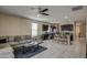 Open floor plan featuring a kitchen island and spacious living room at 3882 W Alabama Ln, San Tan Valley, AZ 85144