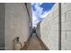 Brick pathway leads to a private backyard, providing convenient access at 3882 W Alabama Ln, San Tan Valley, AZ 85144