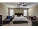 Bright bedroom with a queen-size bed and ample natural light at 3882 W Alabama Ln, San Tan Valley, AZ 85144