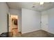 Well-lit bedroom featuring a spacious closet and neutral walls at 3882 W Alabama Ln, San Tan Valley, AZ 85144