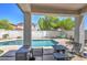 Inviting backyard oasis with a refreshing pool and patio furniture at 3882 W Alabama Ln, San Tan Valley, AZ 85144
