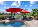 Relaxing pool and spa area with lounge chairs and lake views at 3406 E Wildwood Dr, Phoenix, AZ 85048