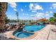Inviting pool and spa with a tranquil lake view at 3406 E Wildwood Dr, Phoenix, AZ 85048