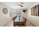 Bright dining room featuring a large wooden table at 3406 E Wildwood Dr, Phoenix, AZ 85048