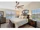 Spacious main bedroom with water views and large windows at 3406 E Wildwood Dr, Phoenix, AZ 85048