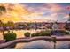 Peaceful lake view from a relaxing poolside setting at 3406 E Wildwood Dr, Phoenix, AZ 85048