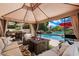 Relaxing patio with fire pit and lake views at 3406 E Wildwood Dr, Phoenix, AZ 85048