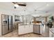 Open concept kitchen with stainless steel appliances at 3406 E Wildwood Dr, Phoenix, AZ 85048