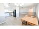 Modern kitchen with white cabinets and granite countertops at 8702 E Boise St, Mesa, AZ 85207
