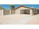 Attached garage with ample space for parking and storage at 8702 E Boise St, Mesa, AZ 85207