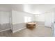 Bright dining area with wood-look floors and a table for four at 8702 E Boise St, Mesa, AZ 85207