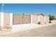 Modern double gate leading to a private driveway at 8702 E Boise St, Mesa, AZ 85207