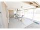 Covered patio with glass-top table and chairs at 8702 E Boise St, Mesa, AZ 85207
