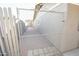 Side yard access with chain link fence and gravel at 8702 E Boise St, Mesa, AZ 85207