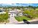 Aerial view of a house with a grassy yard and driveway, showcasing city views at 4307 N 15Th Dr, Phoenix, AZ 85015