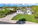 Aerial view showcasing a charming house with a grassy yard and driveway at 4307 N 15Th Dr, Phoenix, AZ 85015