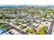 Aerial view of a house with a pool, showcasing the property and surrounding neighborhood at 4307 N 15Th Dr, Phoenix, AZ 85015