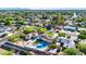 Aerial view of a house with a pool and artificial turf in a residential area at 4307 N 15Th Dr, Phoenix, AZ 85015