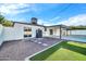 Backyard with patio cover, gravel, and artificial turf at 4307 N 15Th Dr, Phoenix, AZ 85015