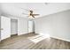 Bright bedroom with ceiling fan and hardwood floors at 4307 N 15Th Dr, Phoenix, AZ 85015