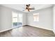 Bedroom with sliding door to backyard and hardwood floors at 4307 N 15Th Dr, Phoenix, AZ 85015